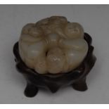 A Chinese pale celadon jade carving, depicting a continuous band of children, 5.