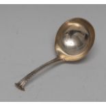 A George III Onslow pattern caddy spoon, feather-edge stem, 9.