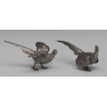 A pair of Elizabeth II silver novelty table decorations, as pheasants, 17cm and 18cm long,