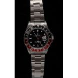 Rolex - a gentleman's GMT Master II stainless steel bracelet watch, black dial,