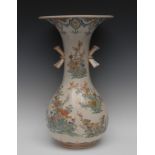 A large Japanese Satsuma bottle vase, decorated with peonies, chrysanthemums and foliage,