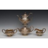 A George IV Rococo Revival silver pedestal tea and coffee pot, rose finials, hinged domed covers,