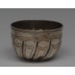 An 18th century Russian silver tumbler cup, wrythen fluted, 5.