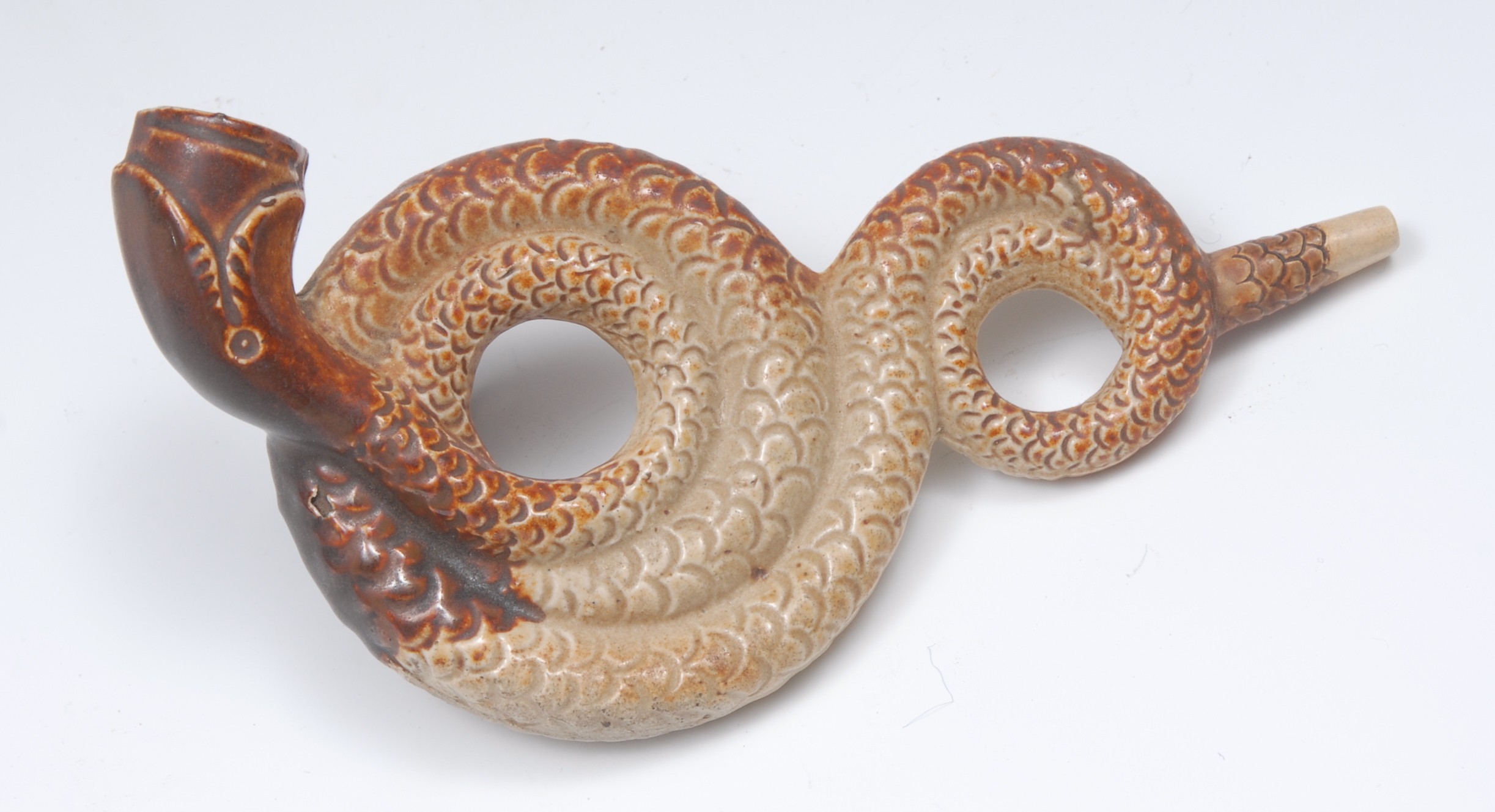 A 19th century brown salt glazed serpent pipe, the bowl formed as the head,