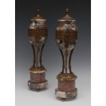 A pair of 19th century gilt metal mounted breccia and rouge marble ovoid mantel urns,