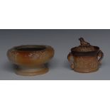 A mid 19th century brown salt glazed stoneware tobacco jar and cover,