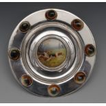 An unusual early 20th century silver coloured metal mounted circular dish,