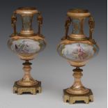 A pair of Continental gilt metal mounted porcelain mantel vases,