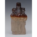 A 19th century two-tone brown salt glazed stoneware novelty flask,