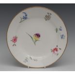 A Swansea circular plate, painted with flower and foliage, gilt line rim, c.