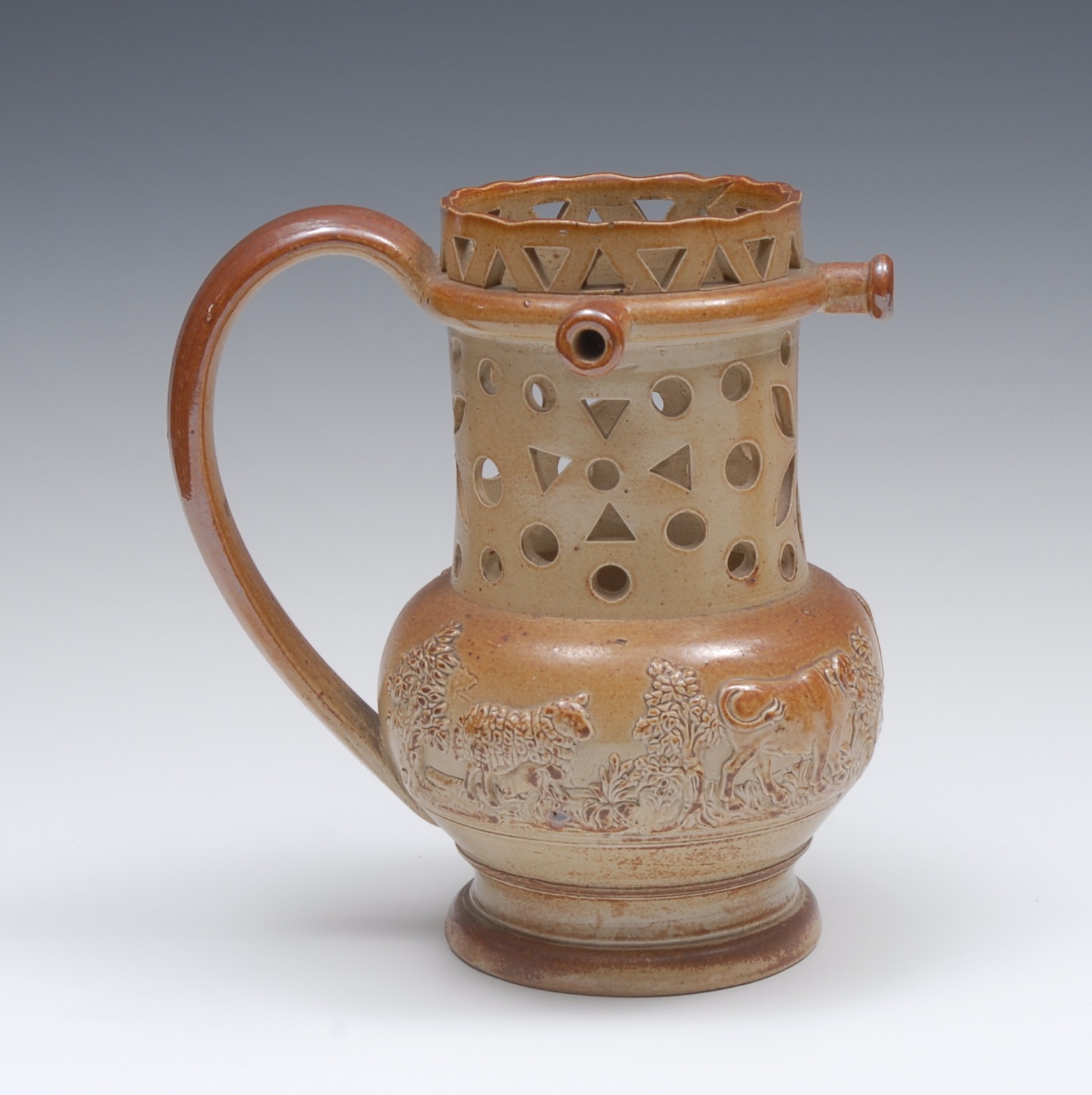 A 19th century brown salt glazed stoneware puzzle jug,