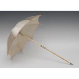 A rare 19th century French 18ct gold child's parasol,