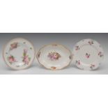 A Derby shaped oval dish, painted with colourful summer flowers, the sides with four bouquets,