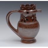 An 19th century Nottingham brown salt glazed stoneware puzzle jug,