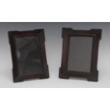 A near pair of Chinese padouk wood shaped rectangular easel photograph frames, 28cm high, 20.