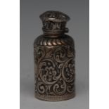 An Edwardian silver coloured metal cylindrical scent bottle,