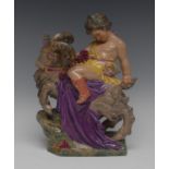 A Charles Vyse figure group, The Boy and Goat, moulded with the youthful Bacchus,