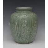 A large Chinese celadon lobed ovoid vase, moulded in relief with eight elders,below scrolls,