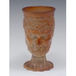 A Brampton brown salt glazed stoneware Bacchus jug, rustic handle, spirally fluted base, 13.