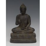Chinese School, a dark patinated bronze, of Buddha, seated in a lotus,