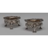 A pair of substantial George III silver salts, boldly chased with flowers, shells and C-scrolls,
