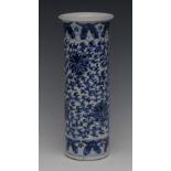 A Chinese blue and white sleeve vase, decorated in underglaze blue with scrolling foliage,