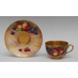 A Royal Worcester teacup and saucer, painted by Moseley and Price, with ripe peaches,