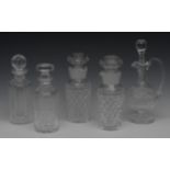 A pair of Waterfords water decanters and stoppers, hobnail cut,