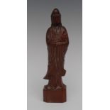A Chinese boxwood figure, well carved as Guanyin holding a bottle and prayer beads,