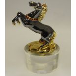 A contemporary oriental Horse shaped glass paperweight, boxed.
