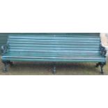 A Victorian Coalbrookdale style cast iron and slatted wood garden bench, acanthus scroll ends,