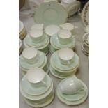 A Minton twelve piece setting tea service, glazed in mint green tones,
