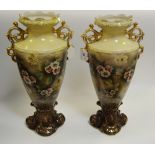 A pair of Staffordshire mantel vases printed with flowers c 1900