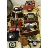 Photographic Equipment - Voigtlander cameras; a boxed Paillard cine camera; an Halina camera;