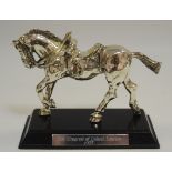 A white metal model of a Horse ,