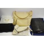 Ladies bags - a Gino Ferrari black leather document case; an Anya Hindmarch cream leather tote bag;