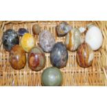 A collection of hard stone eggs,