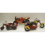 Toys - a contemporary tin-plate super bike; a vintage motorbike and sidecar;