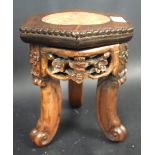 A small Chinese padouk wood hexagonal jardiniere stand, beaded top with inset rouge marble roundel,