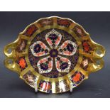 A Royal Crown Derby 1128 pattern shaped circular pedestal dish