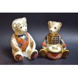 A Royal Crown Derby paperweight Drummer bear; another; a Teddy bear,