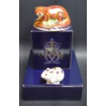 A Royal Crown Derby paperweight, Otter, gold stopper, boxed; another, Collectors Edition Bank Vole,