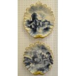 A pair of English Delft wall plaques hand - painted with River scenes, signed WT(W.Thomas) c.