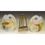 A pair of English porcelain hand-painted plaques in the form of an artist's palette,