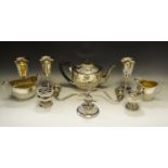 Plated ware - a three piece boat shaped tea service; Goblets; Candelabrum;