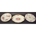 A Derby shaped oval dish, painted with colourful summer flowers, the sides with four bouquets,