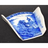 A Derby tapered asparagus server, decorated in underglaze blue with pagoda and trees, cell border,