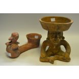 Tribal Art - a stoneware seated figure;