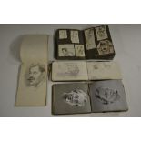 A collection of artists' sketchbooks,