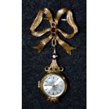 A 9ct gold garnet set Rotary nurse's fob watch, silvered dial, baton arrows, manual movement,